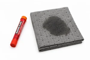 A marine flare and oil absorbent pad