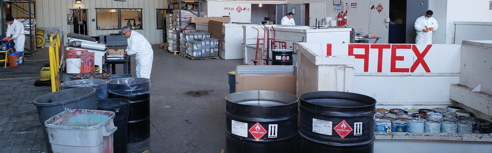 People sorting waste at the Marin HHW Facility